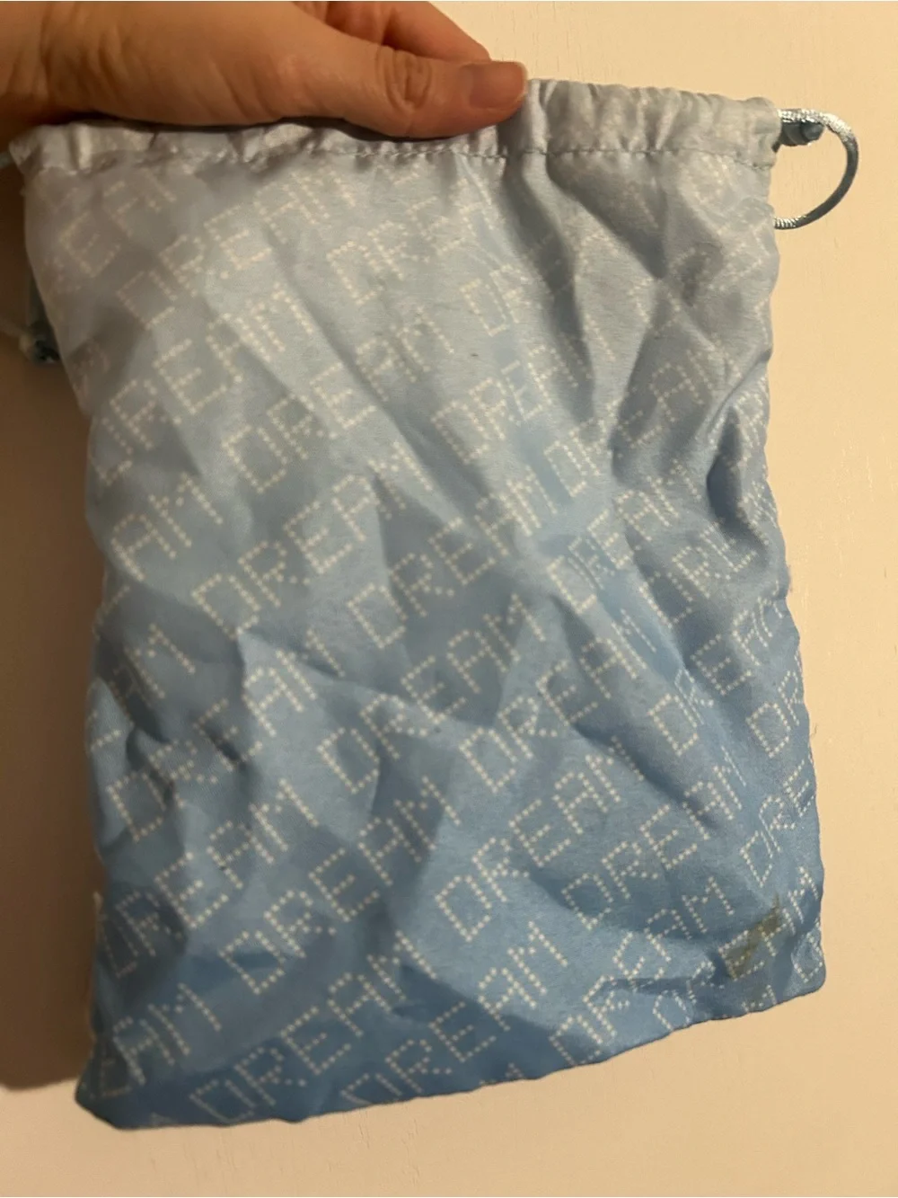Light Blue Drawstring Pouch with 'DREAM' Pattern